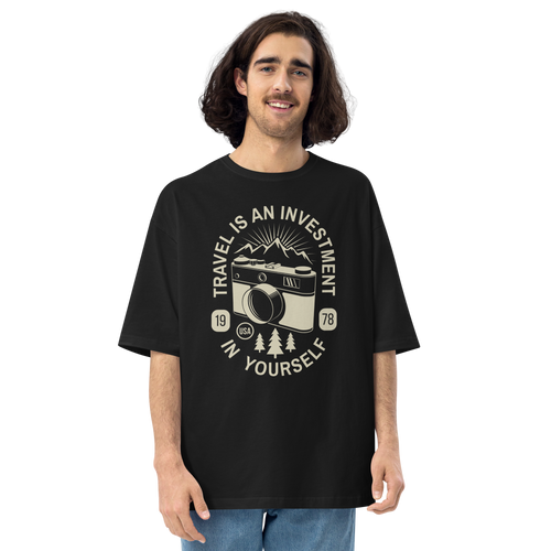 Black / S Travel Is An Investment In Yourself Front Unisex Oversized T-Shirt by Design Express