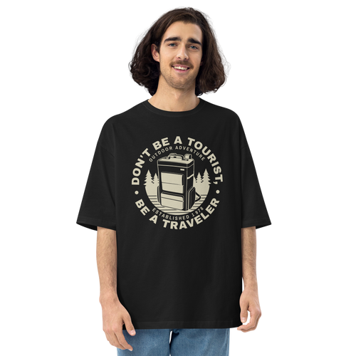 Black / S Don't Be Tourist, Be A Traveller Front Unisex Oversized T-Shirt by Design Express