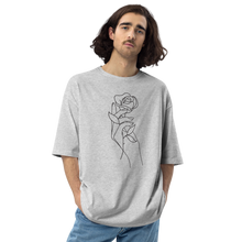 Rose in Hand Unisex Oversized Light T-Shirt by Design Express