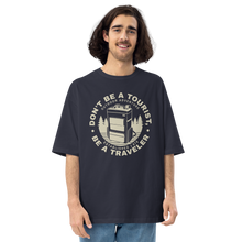 Navy / S Don't Be Tourist, Be A Traveller Front Unisex Oversized T-Shirt by Design Express